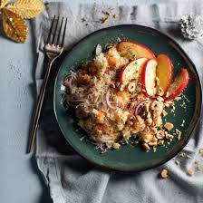 Afbeelding van Geroosterde perziken met honing en notenkrokant